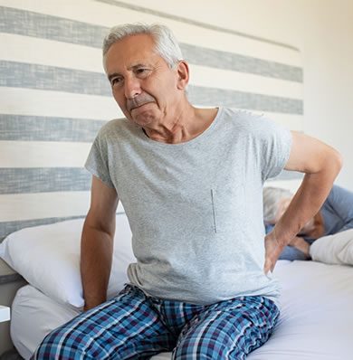 Older man with backache